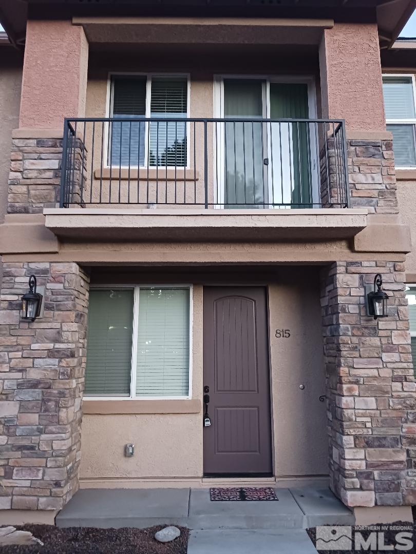 a front view of a house with balcony