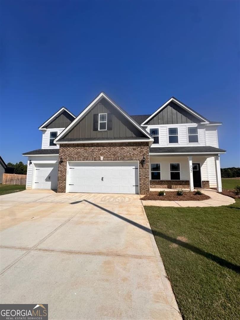 a front view of a house with yard