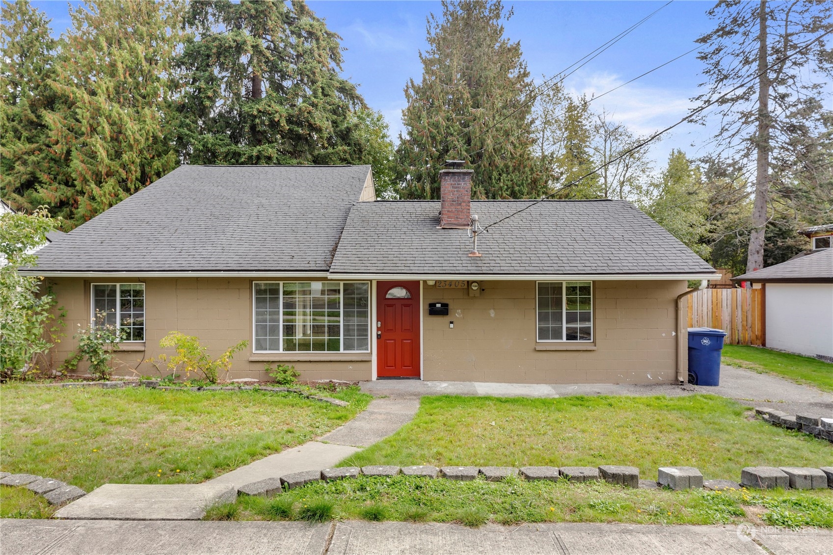 front view of a house with a yard