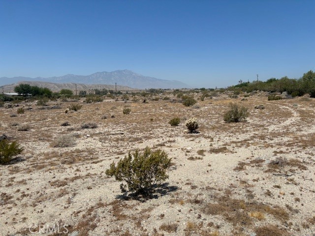 a view of beach and mountain