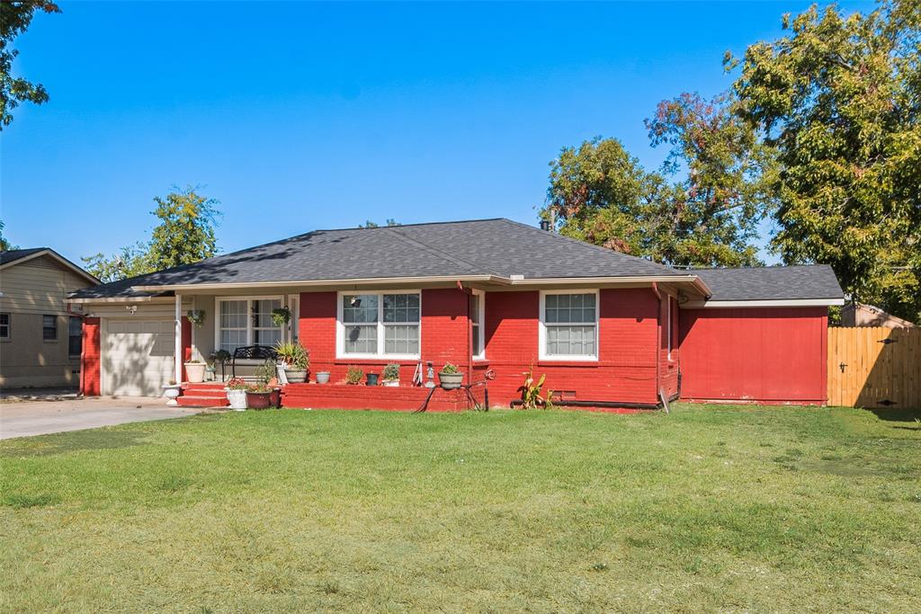 front view of a house with a big yard