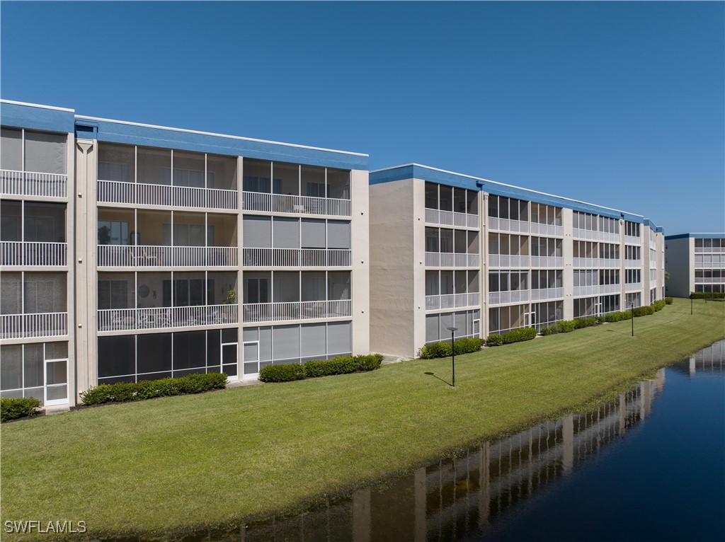 a view of building with yard