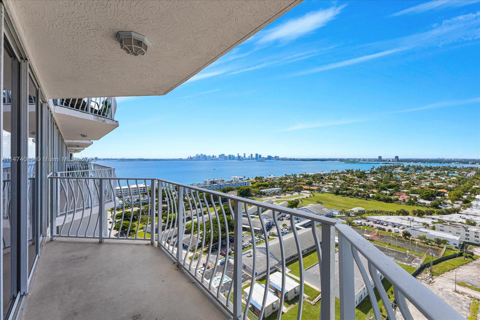 a view of a balcony with an ocean view