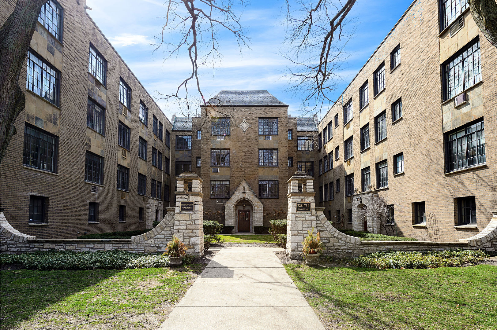 a view of a building with a yard