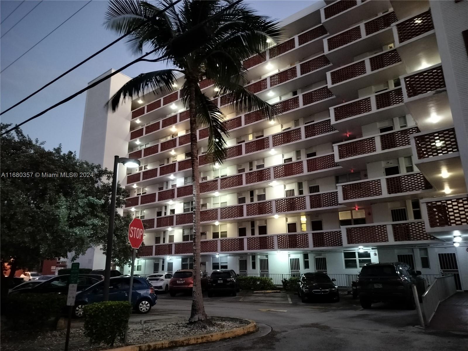 a front view of a building with street view