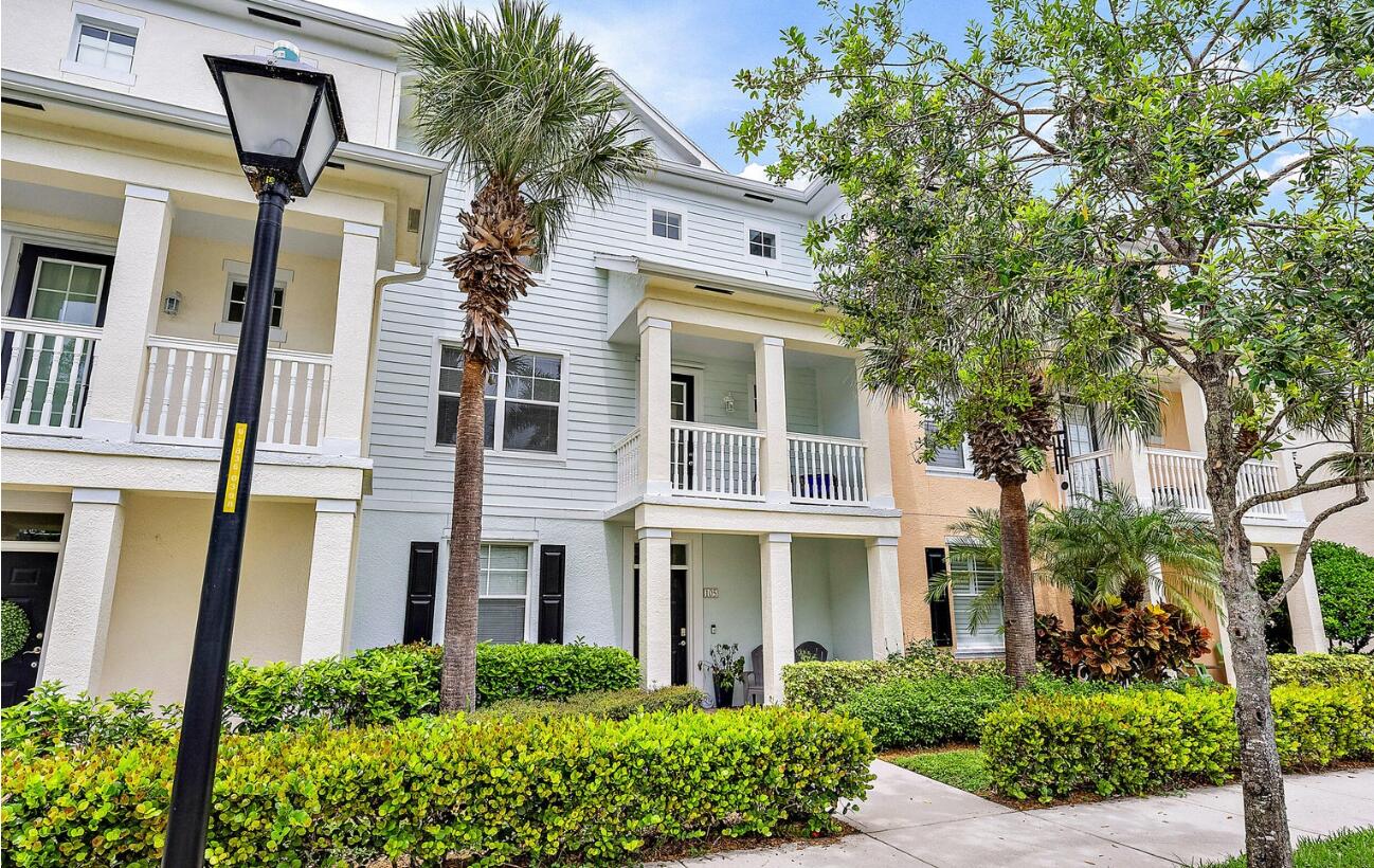 a front view of a multi story residential apartment building