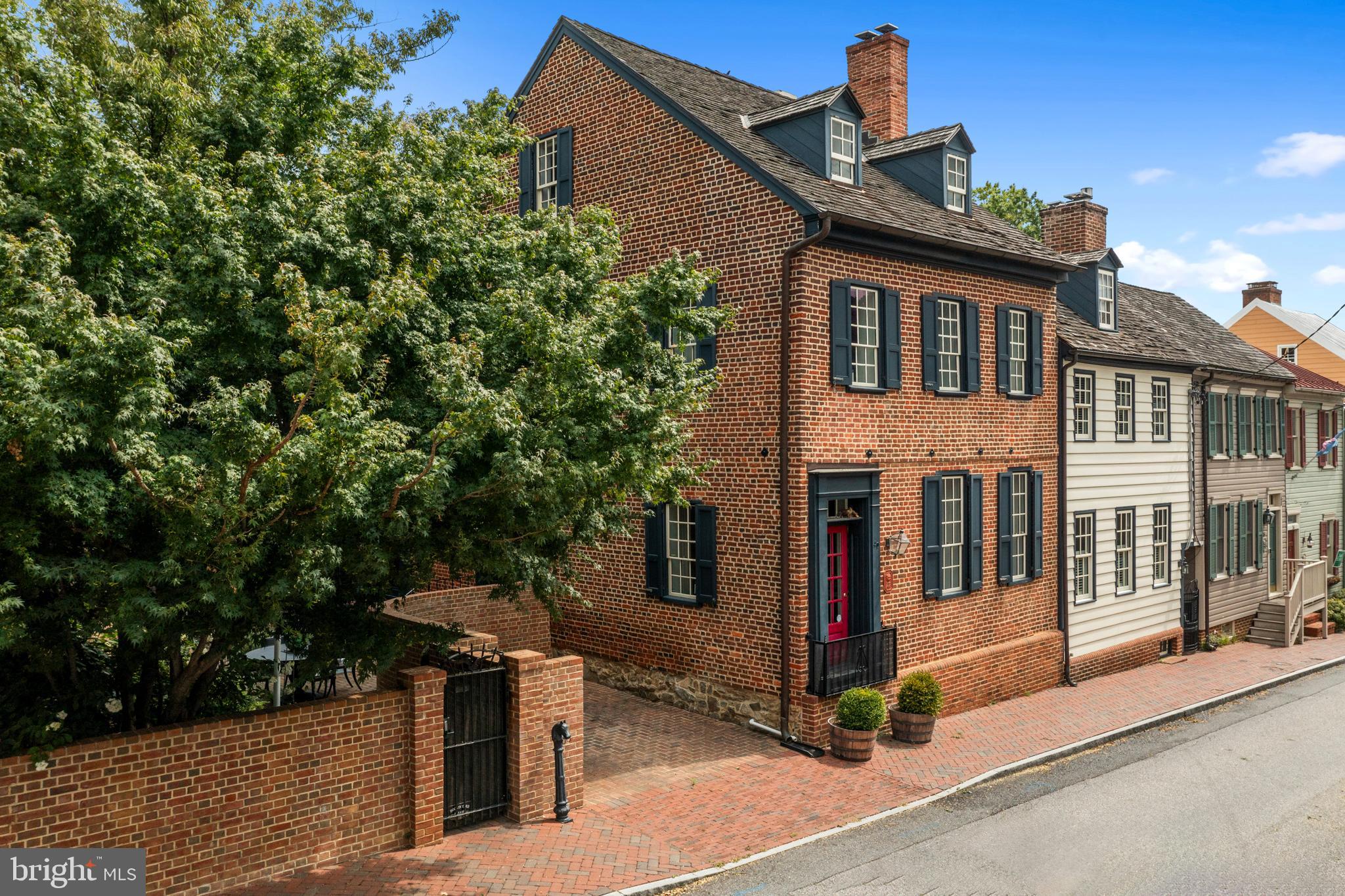 a front view of a house with a porch