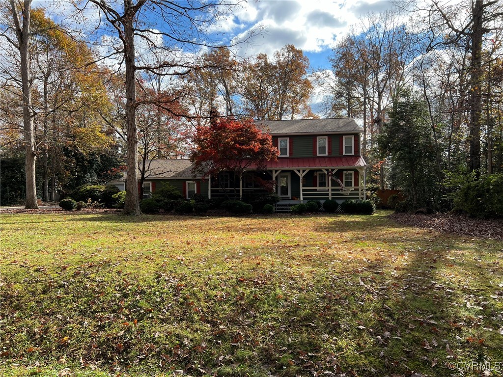 View of front facade featuring a porch and a front