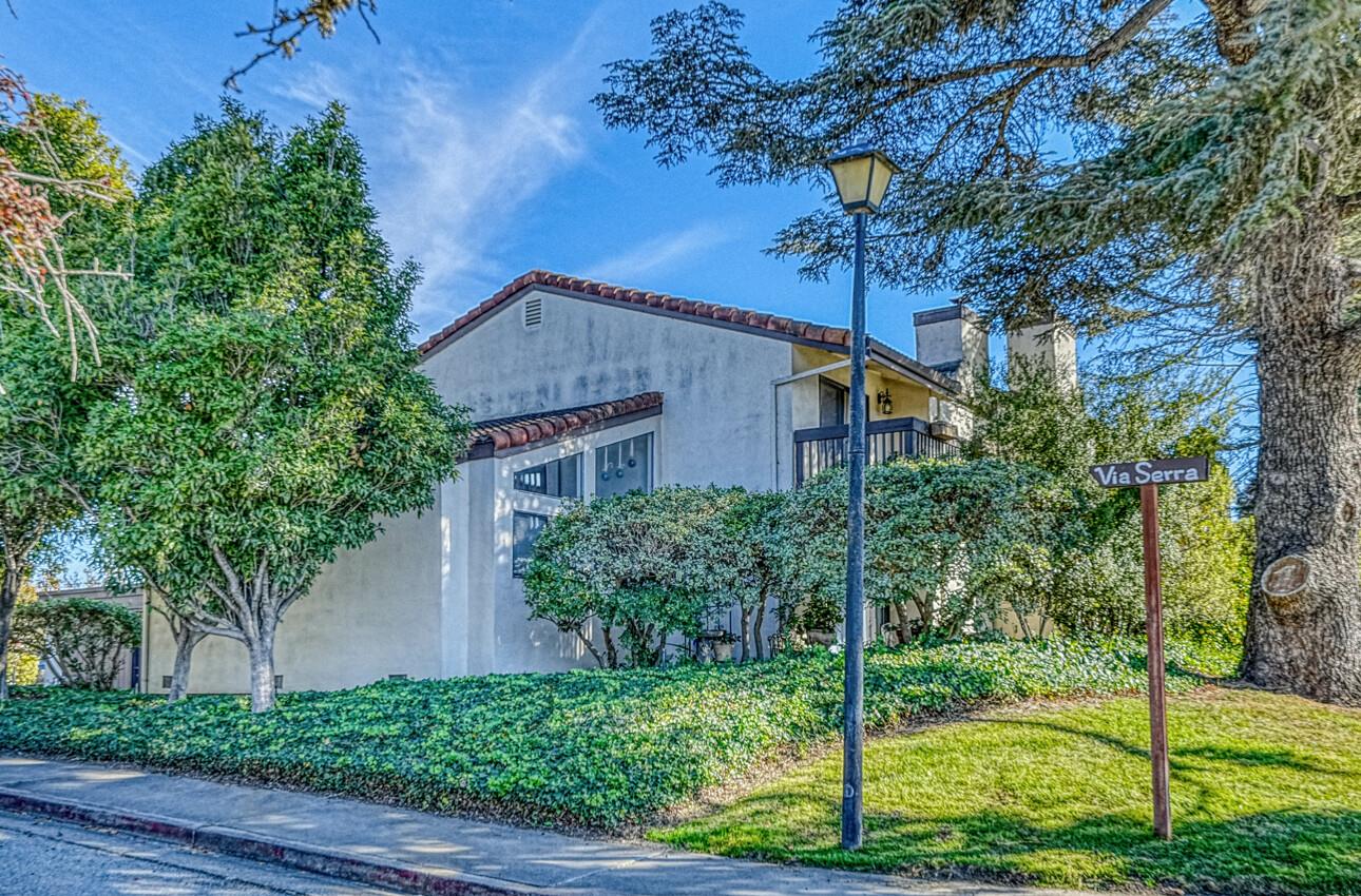 a house view with a garden space