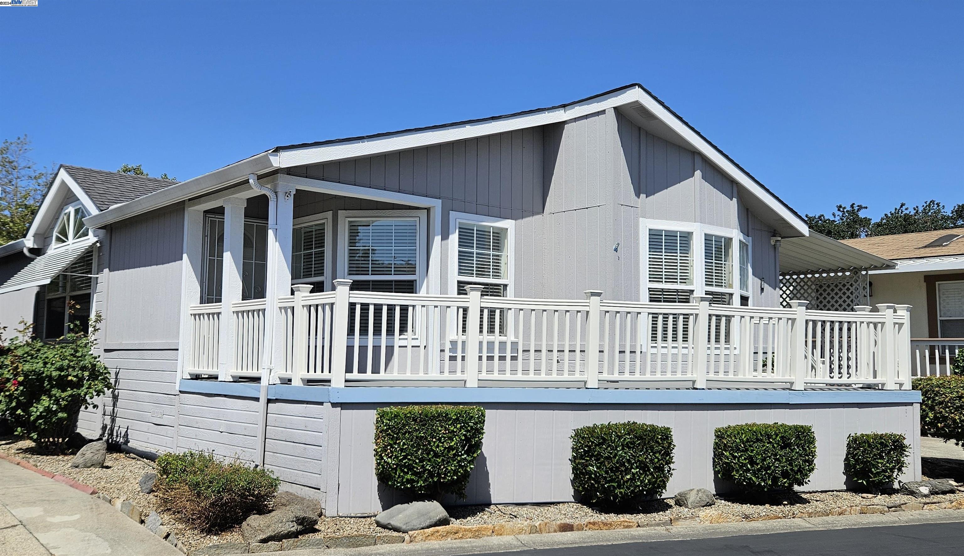 a front view of a house with garage