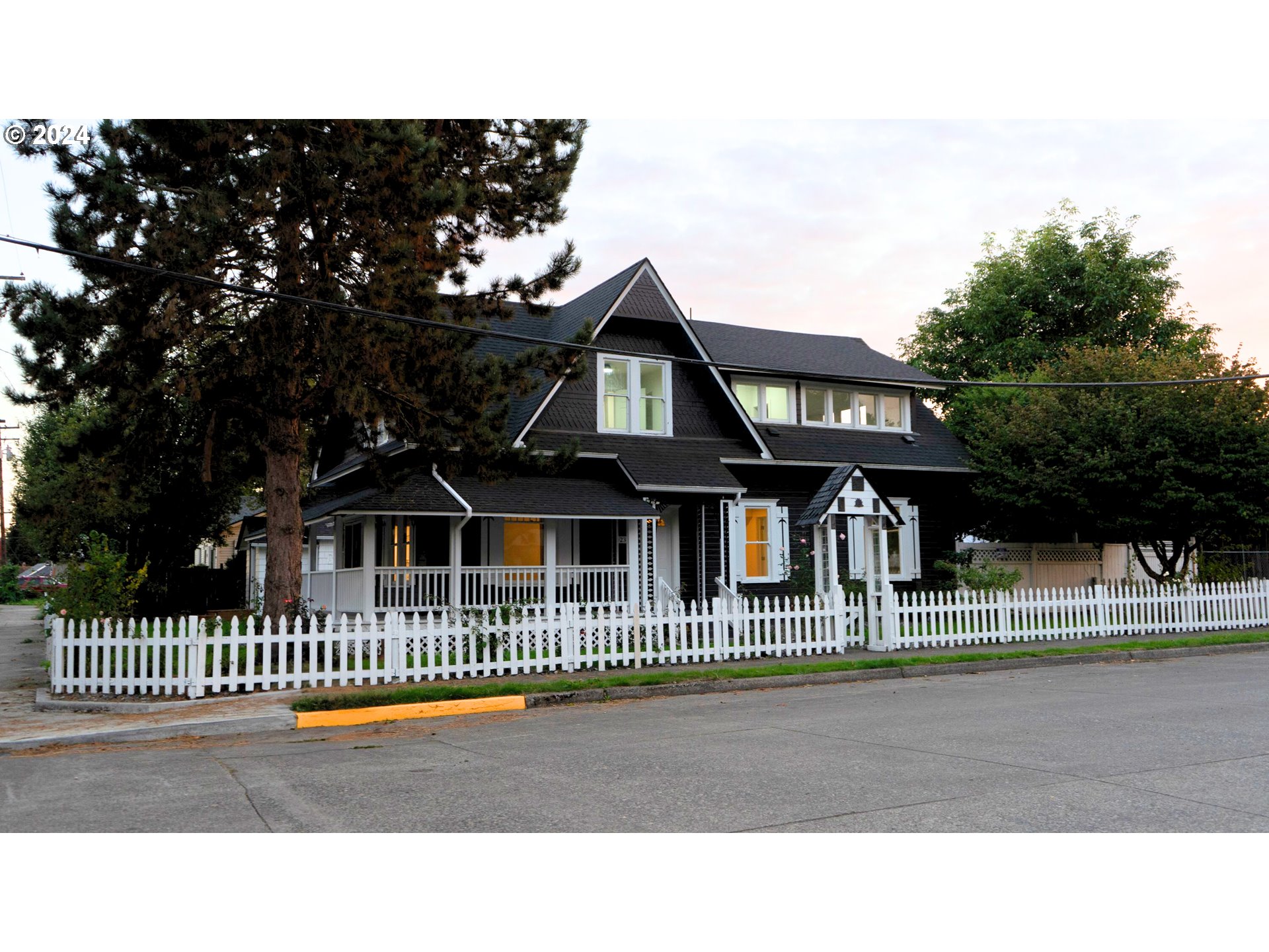 a black and white house with a outdoor view