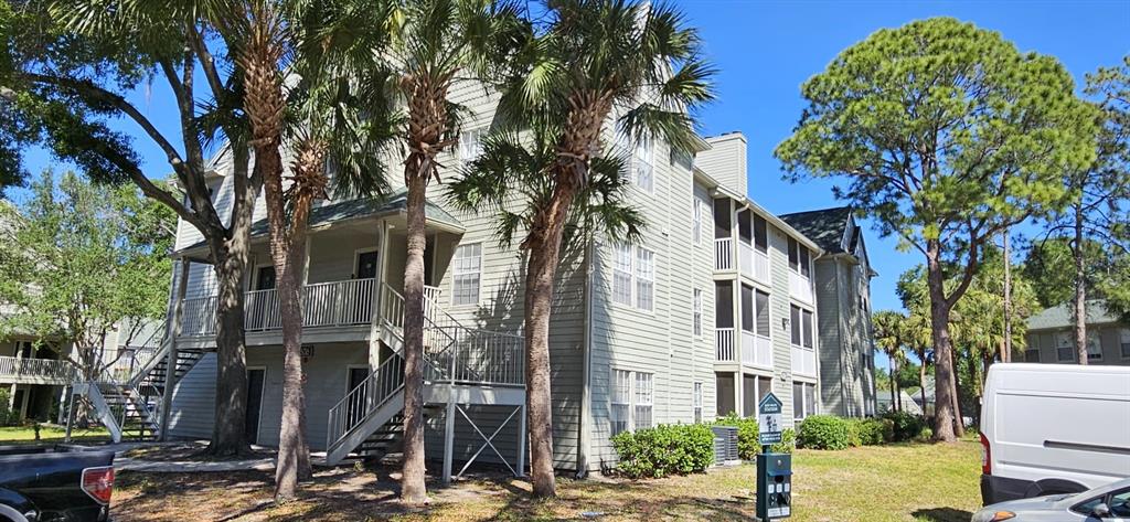 a front view of a multi story residential apartment buildings