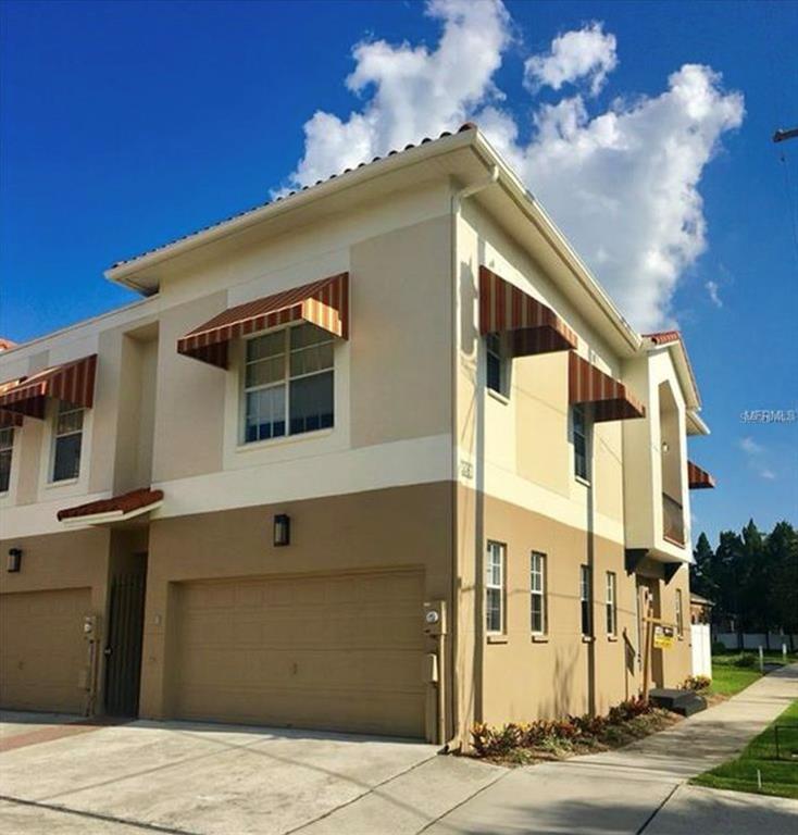 a front view of a house with a garage