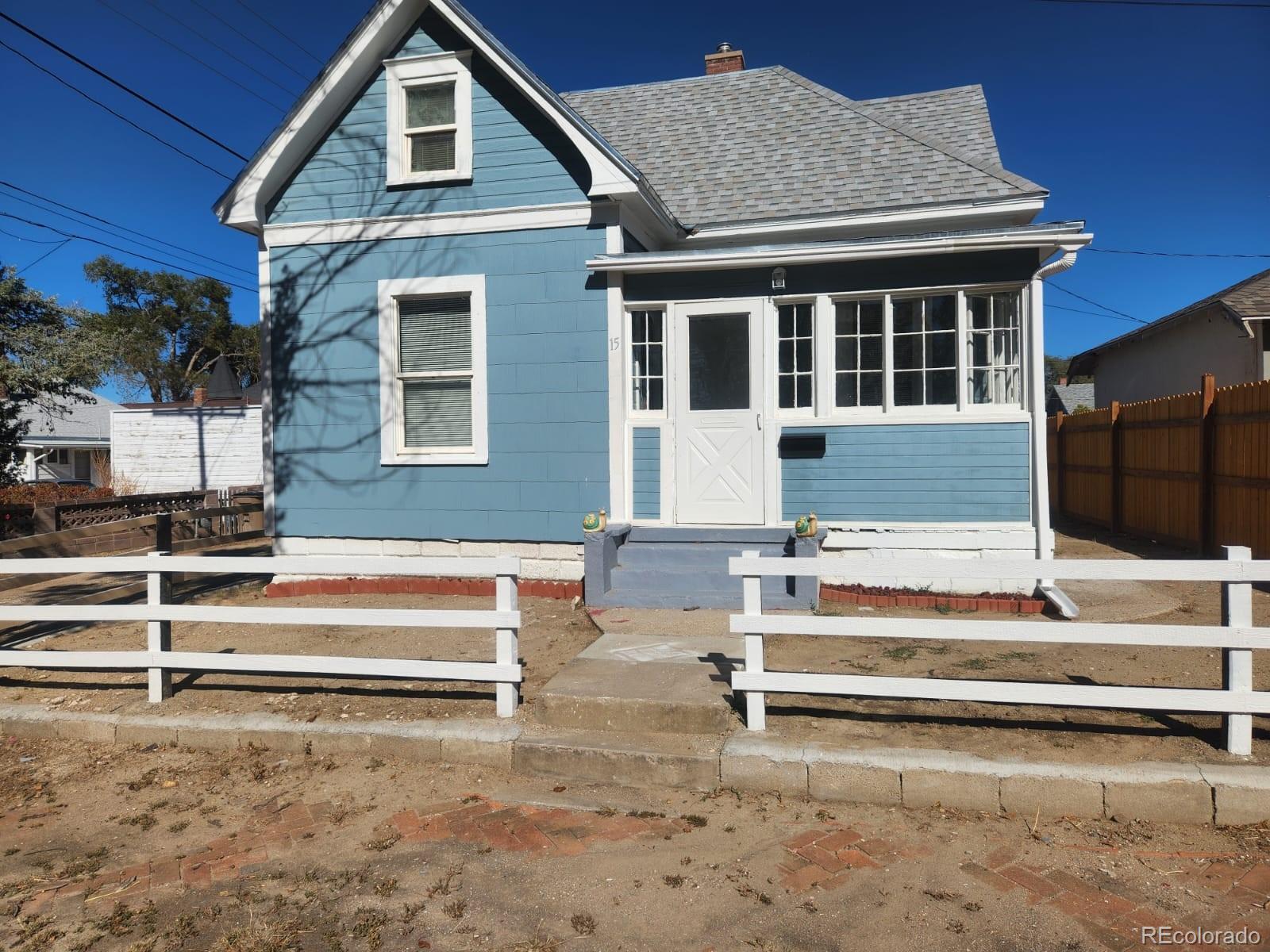 a front view of a house with a garage