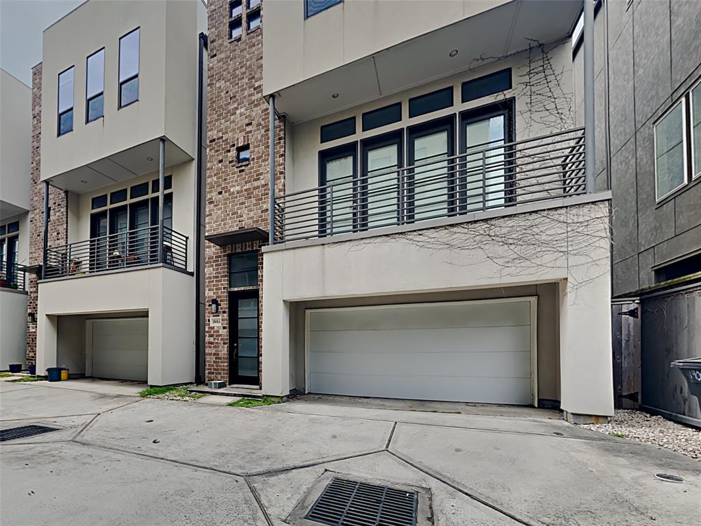 a front view of a house with a garage