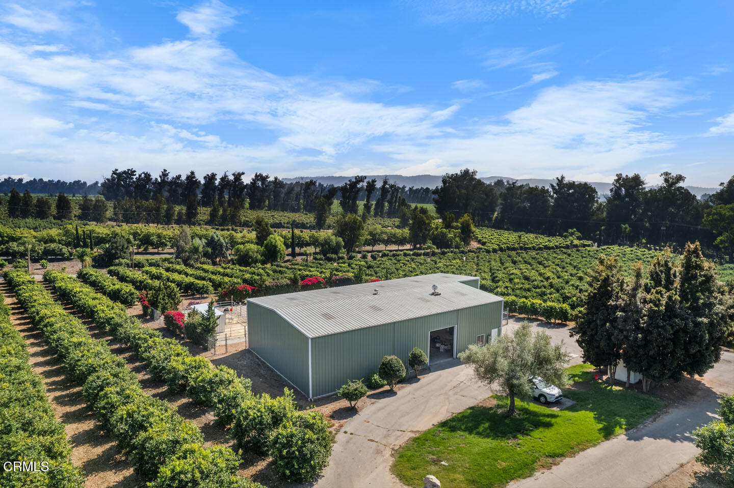 an aerial view of a house with a garden