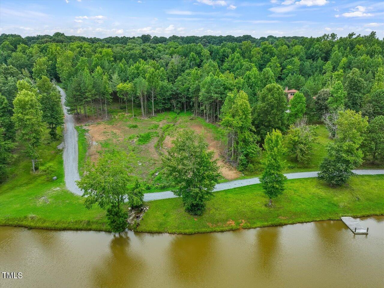 a view of a garden with a lake