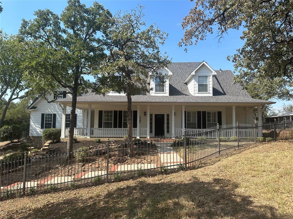 a front view of a house with a patio