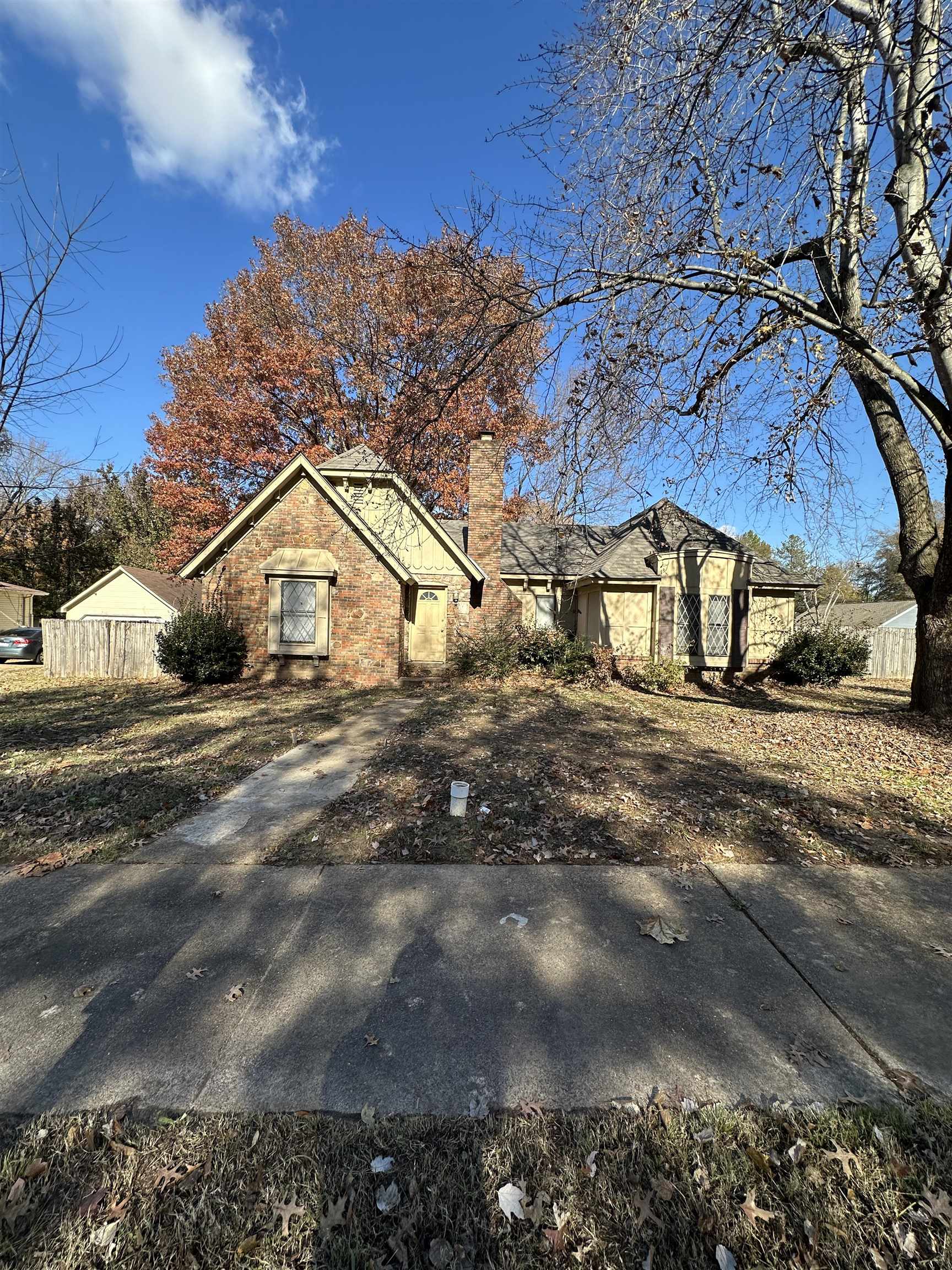 a view of house with outdoor space