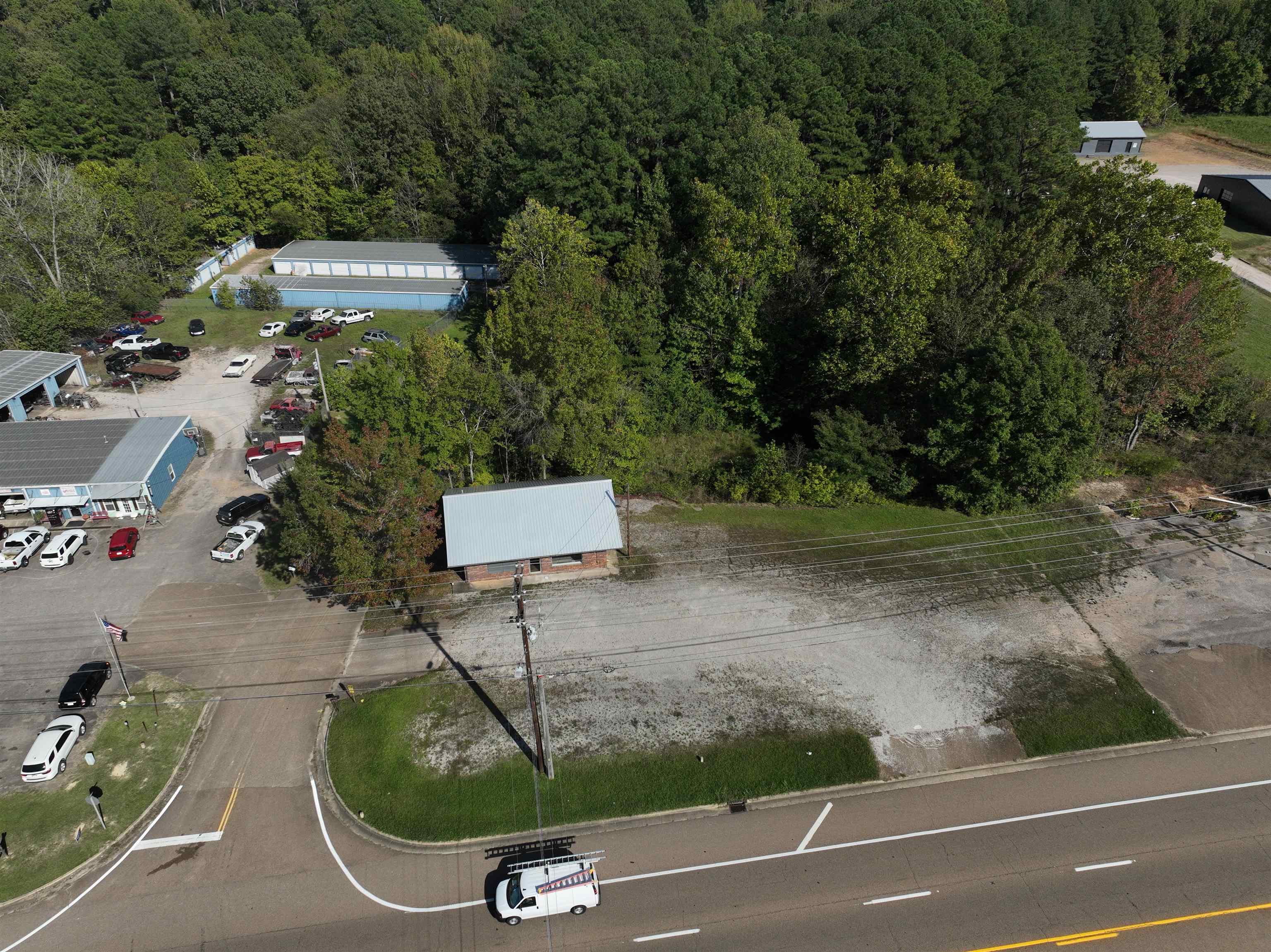 an aerial view of a house having yard