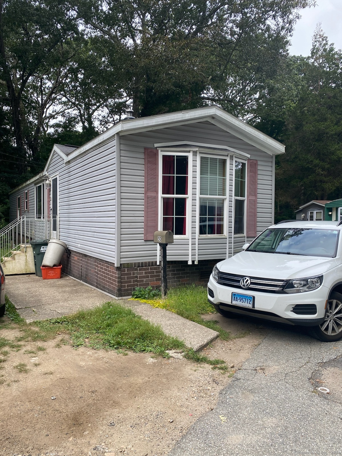 a car parked in front of a house