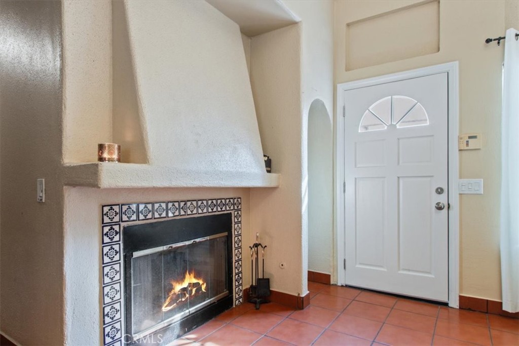 a living room with a fireplace