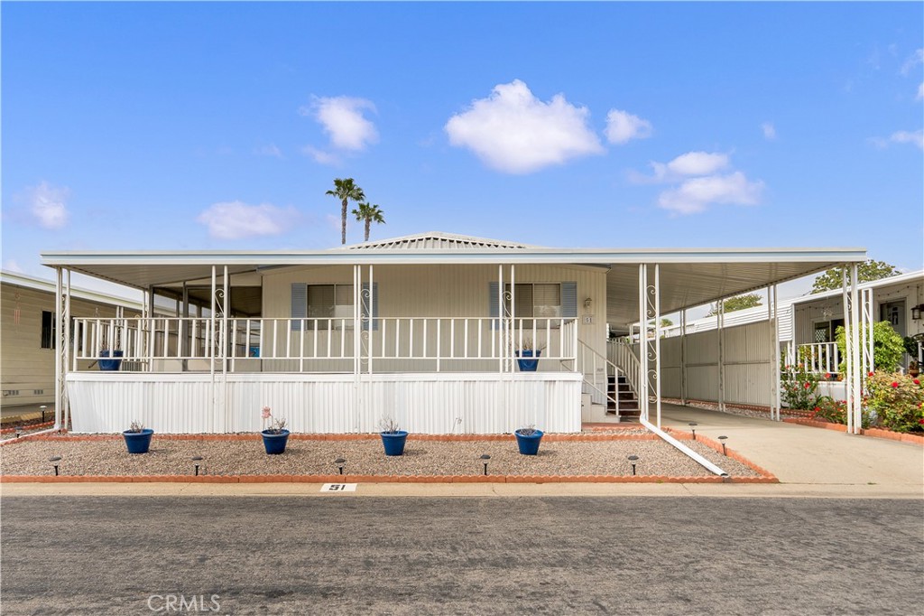 front view of a house with a patio