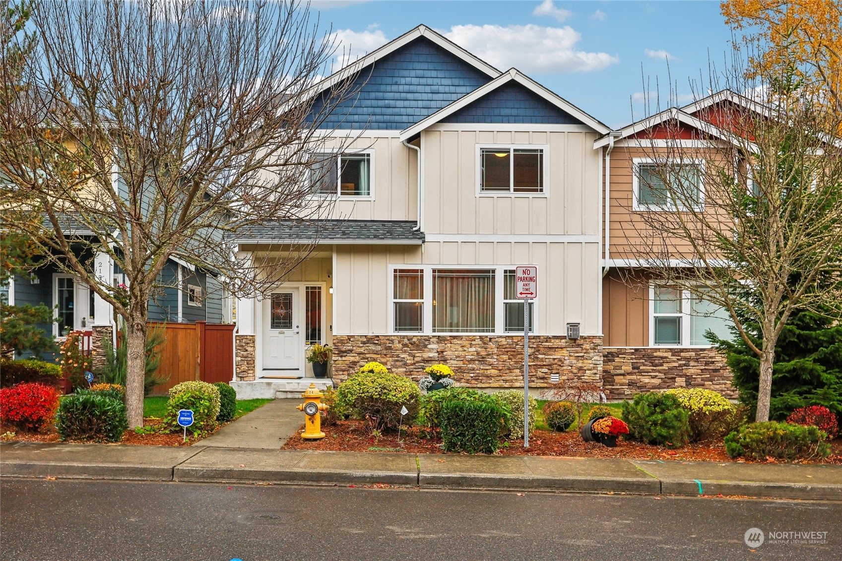 front view of a house with a yard