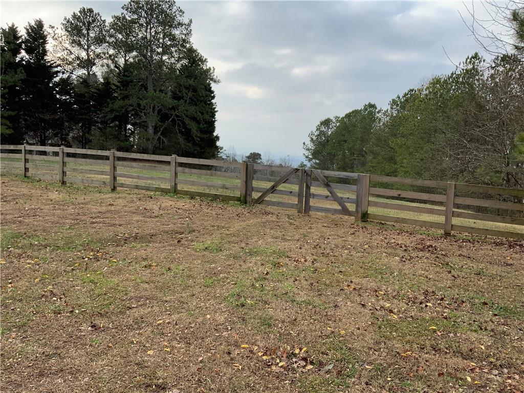 a view of a bench in a field