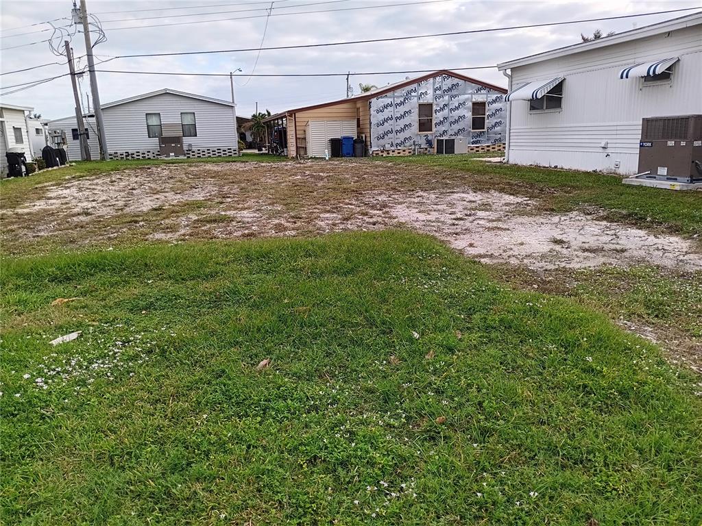 a view of a house with a back yard