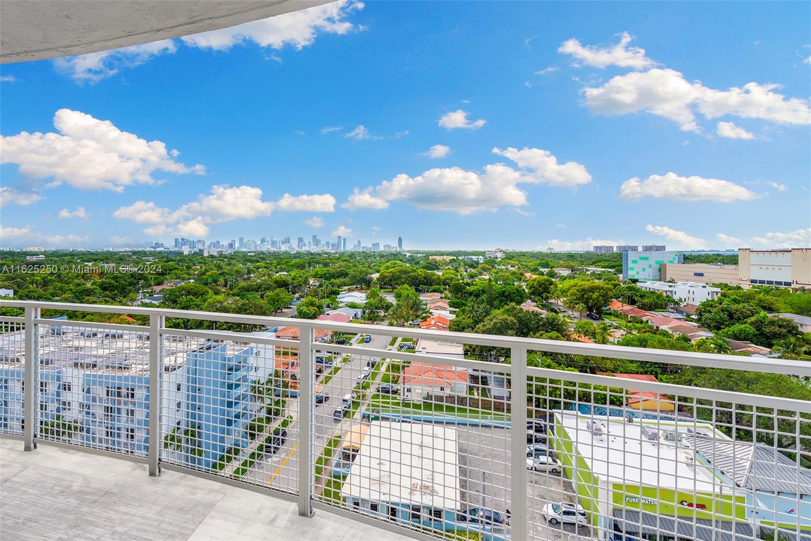 a view of city from a balcony