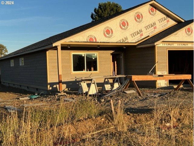 a front view of a house with yard