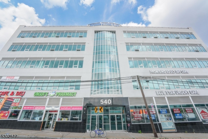 a front view of building with glass windows