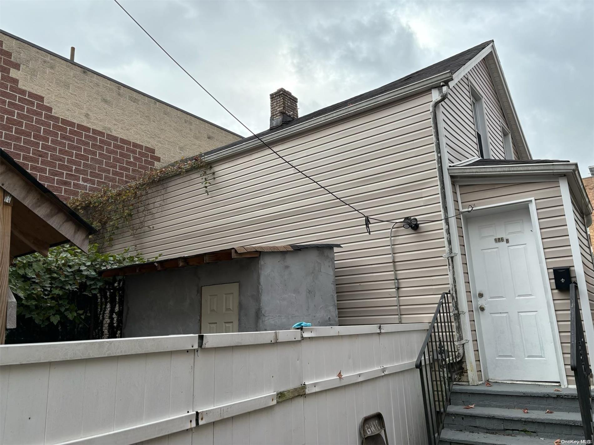 a front view of a house with garage