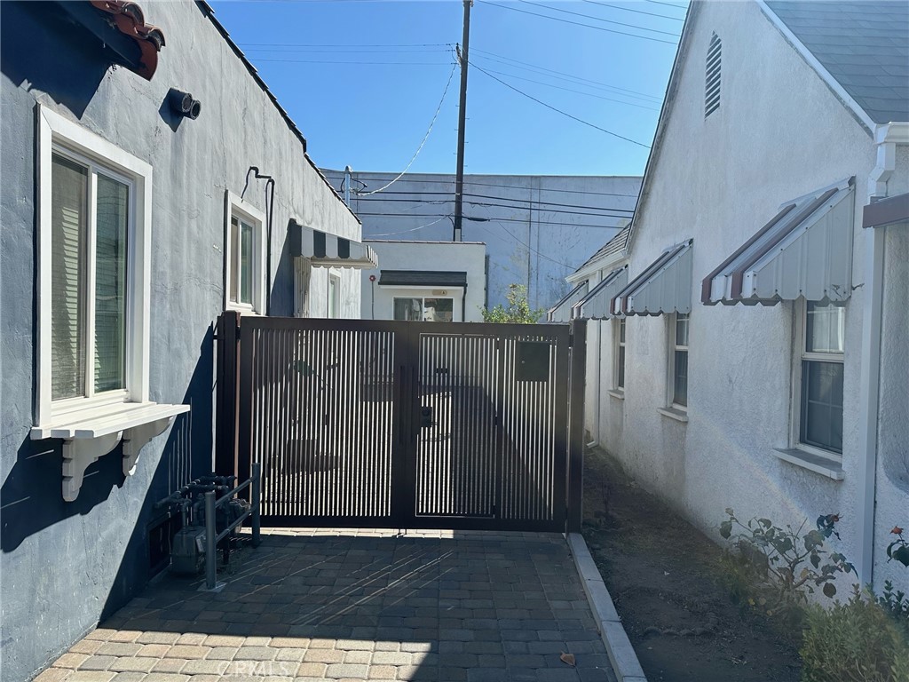 a view of a porch with wooden floor and stairs