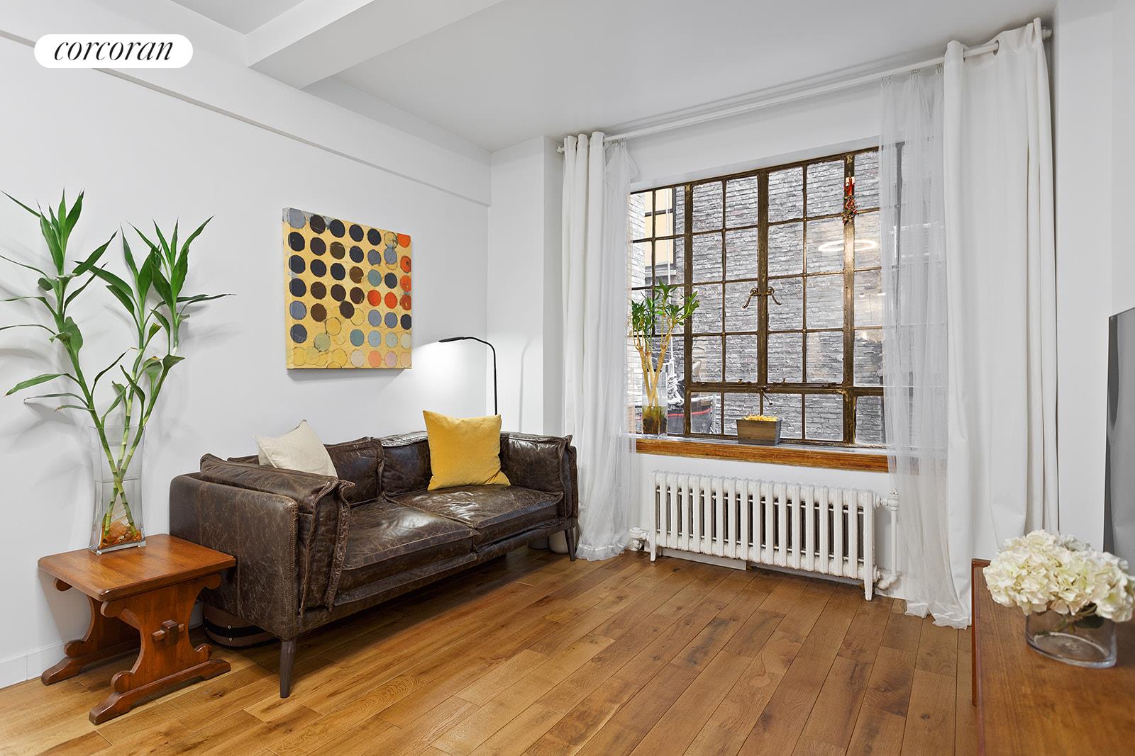 a view of a livingroom with furniture and couch