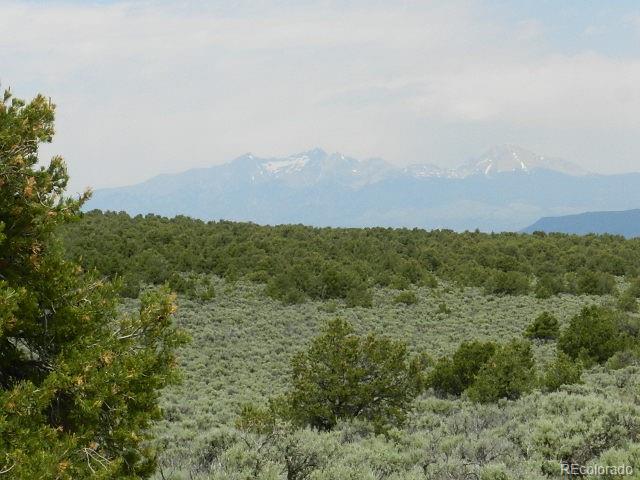 a view of a city with top of mountains in the background