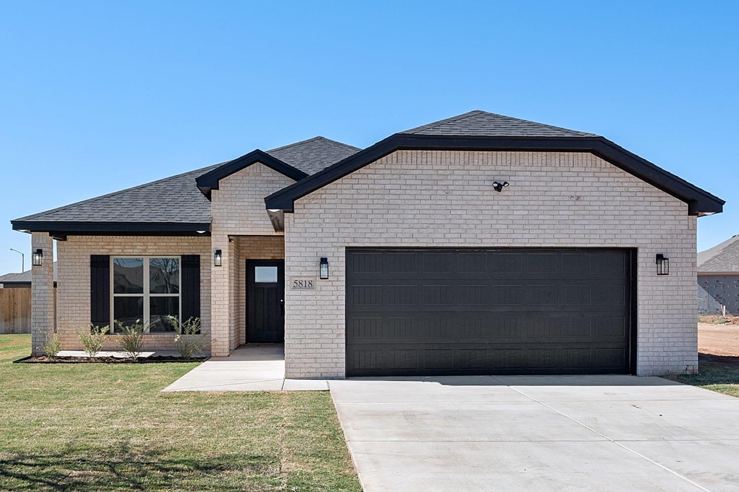 a front view of house with yard