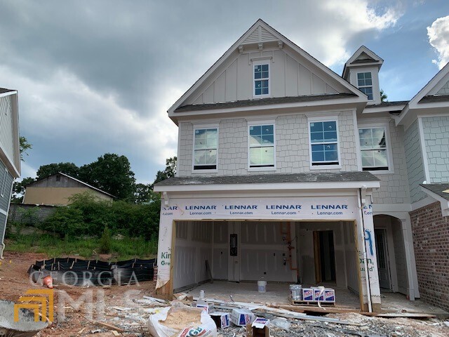 a front view of a house with yard