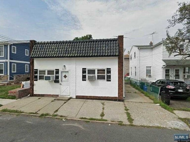 a view of a house with a patio