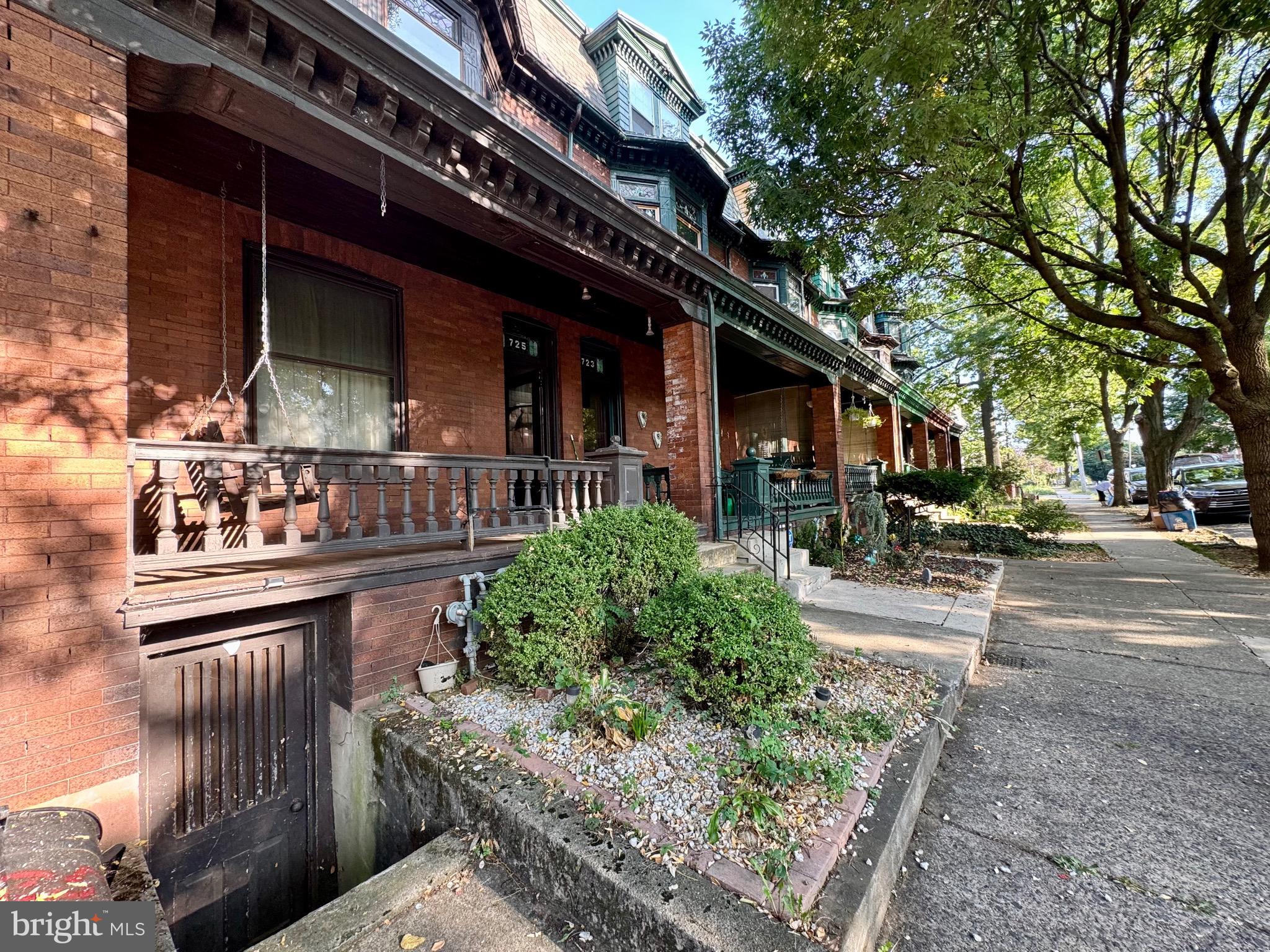 a view of a chairs and table in the patio