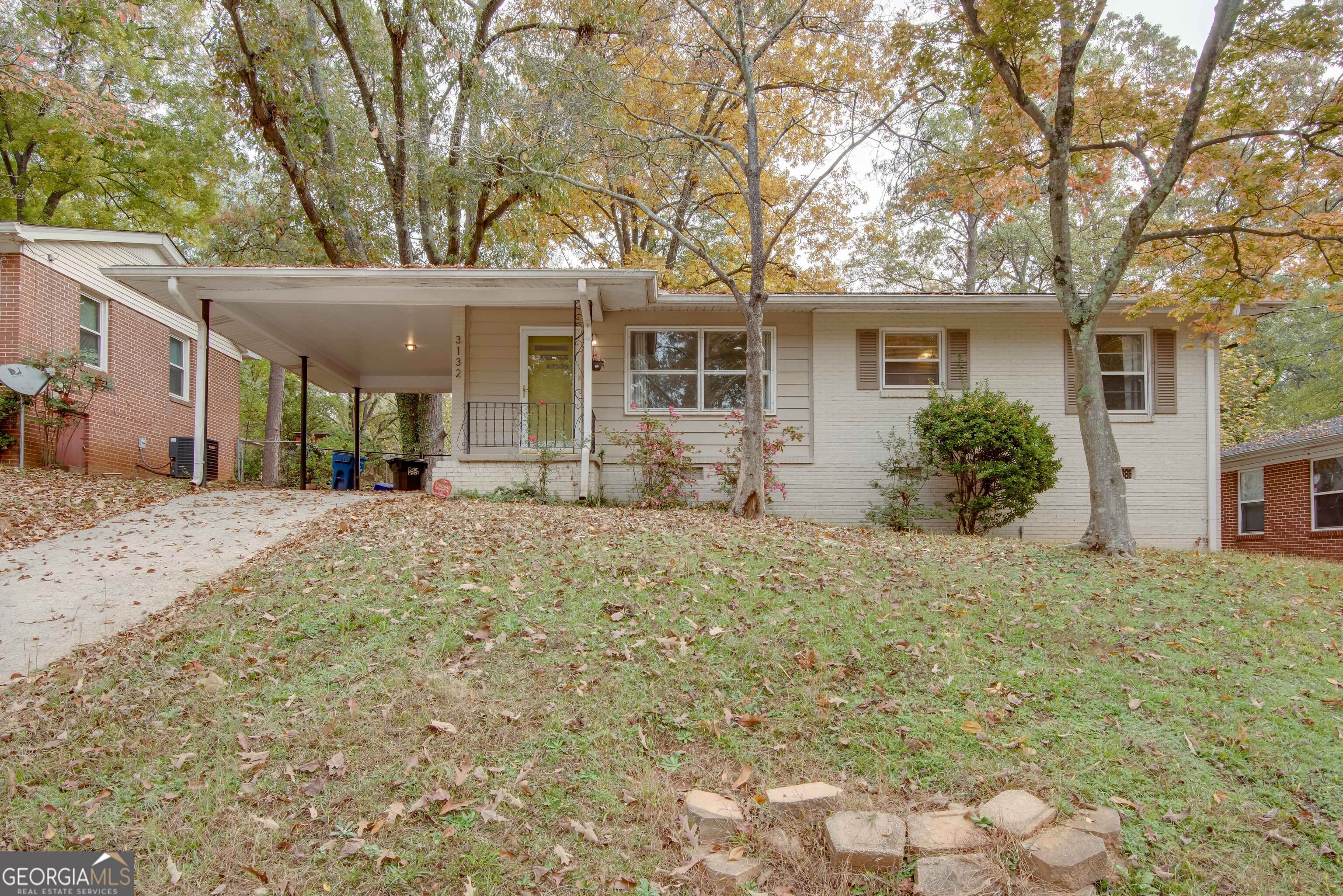 front view of a house with a yard