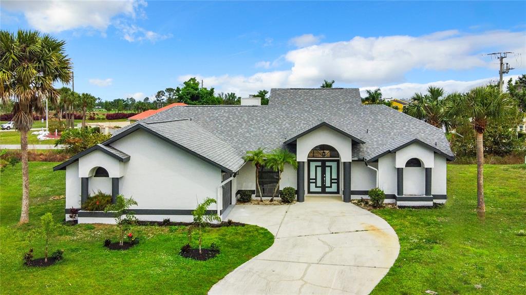 a house view with a garden space