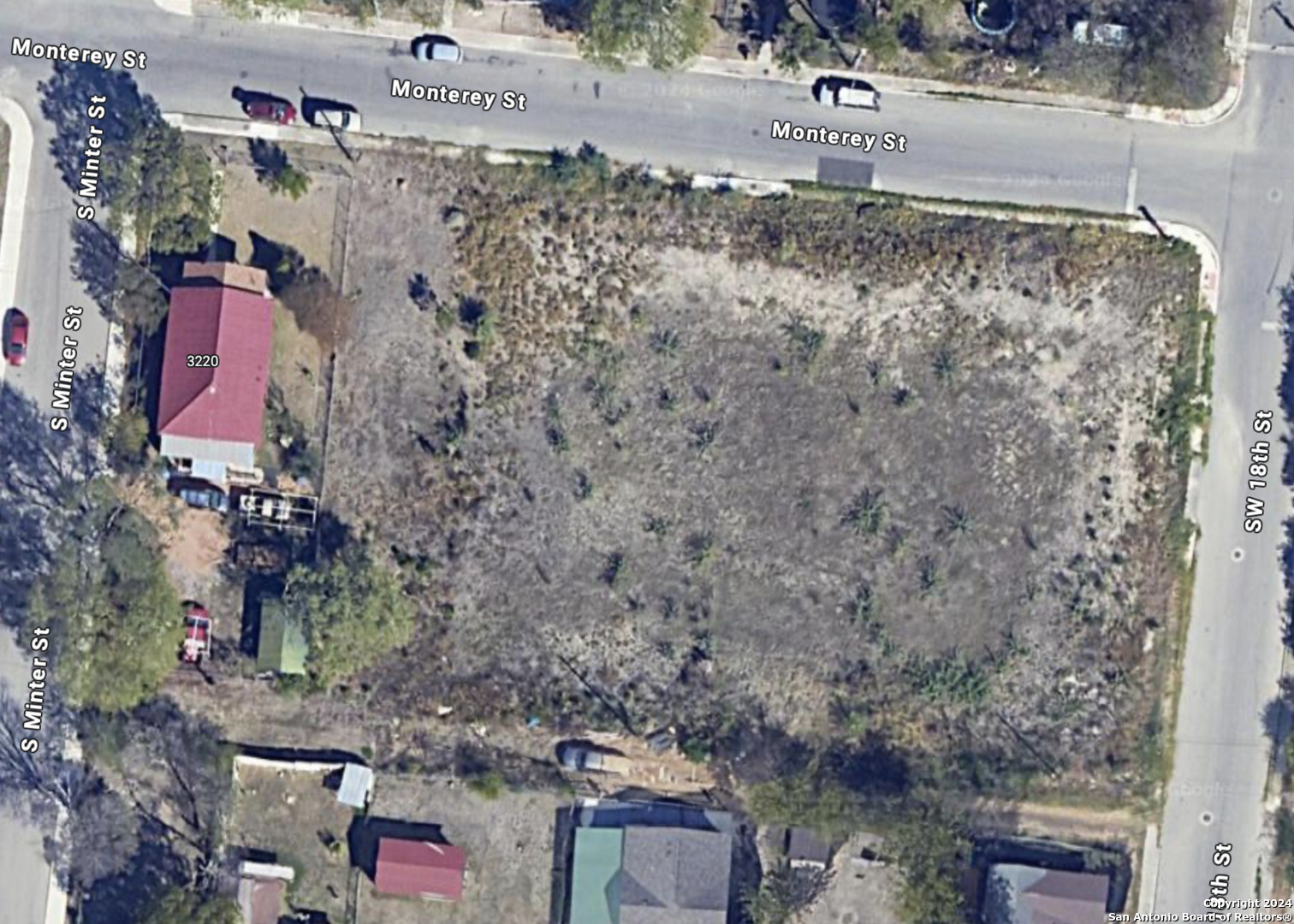 a aerial view of a house with a yard