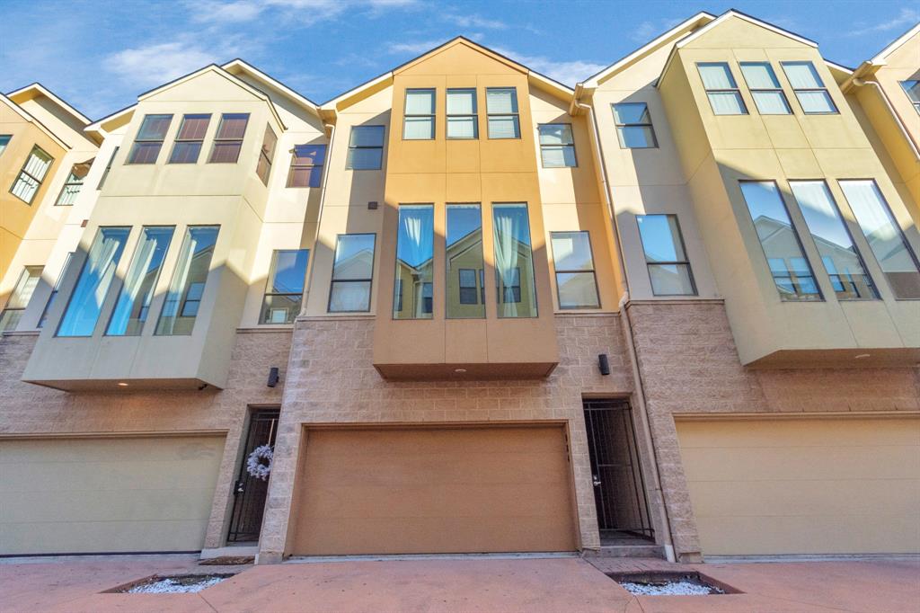 a front view of a multi story residential apartment building