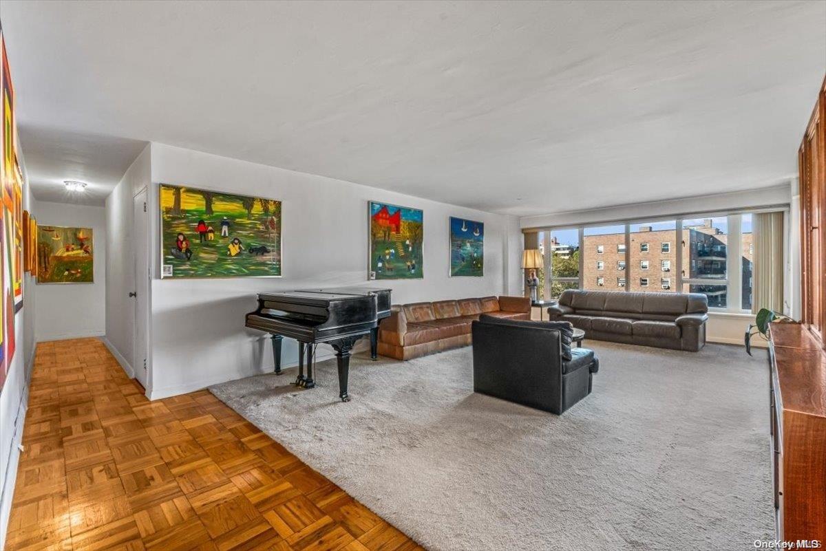 a living room with furniture and a window