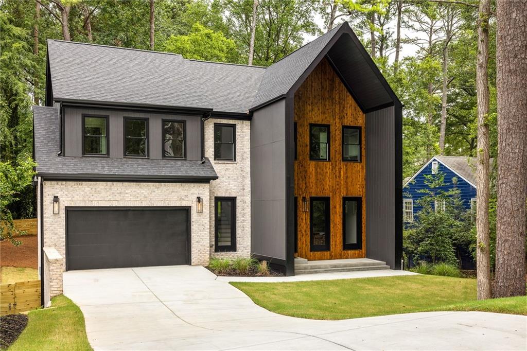 a front view of a house with yard