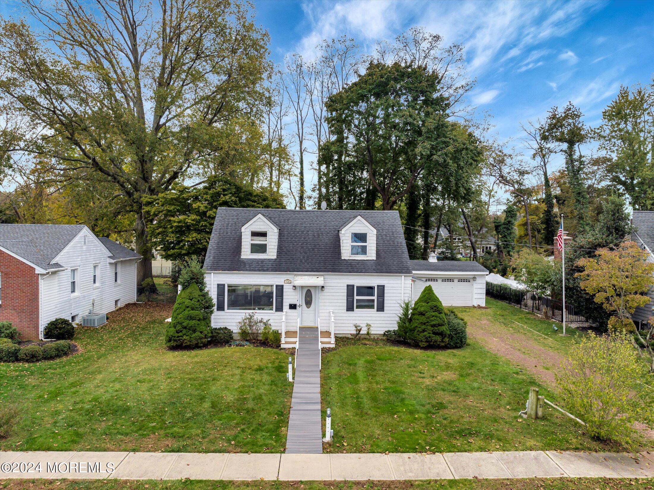 front view of a house with a yard