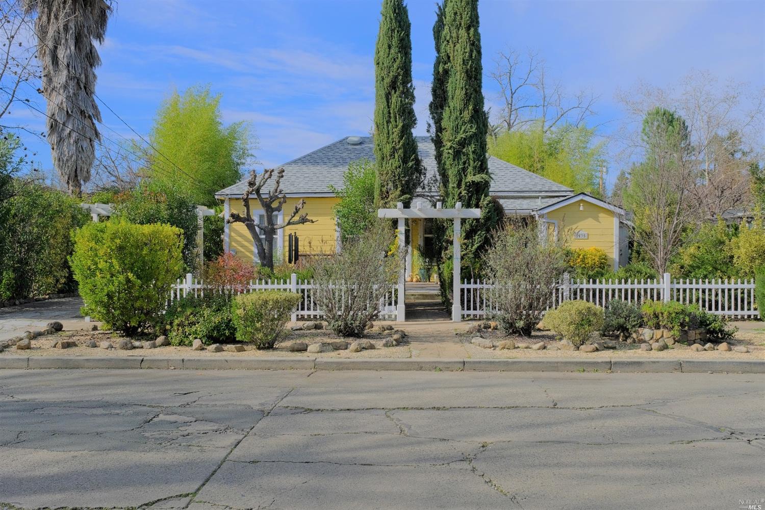 front view of a house with a street