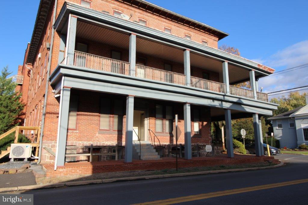 a view of a building with a balcony